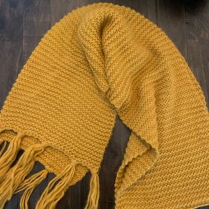 Mustard colored knitted scarf